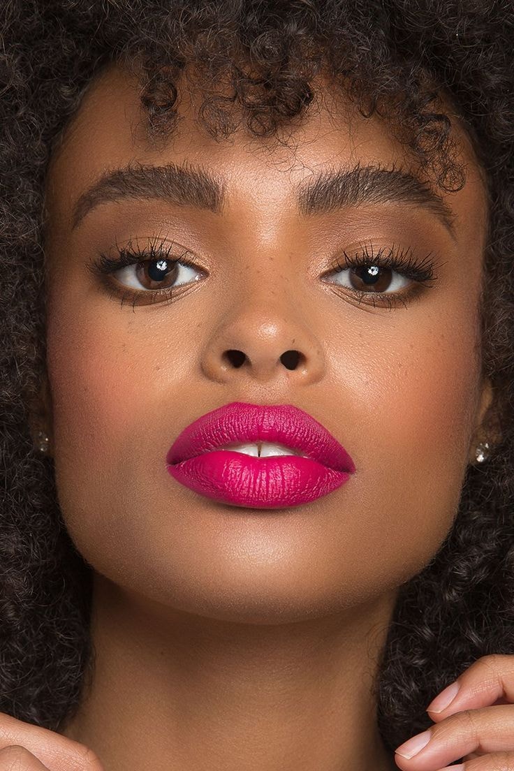 BeHER Hot Pink Luminous Lip Gloss — model wearing hot pink